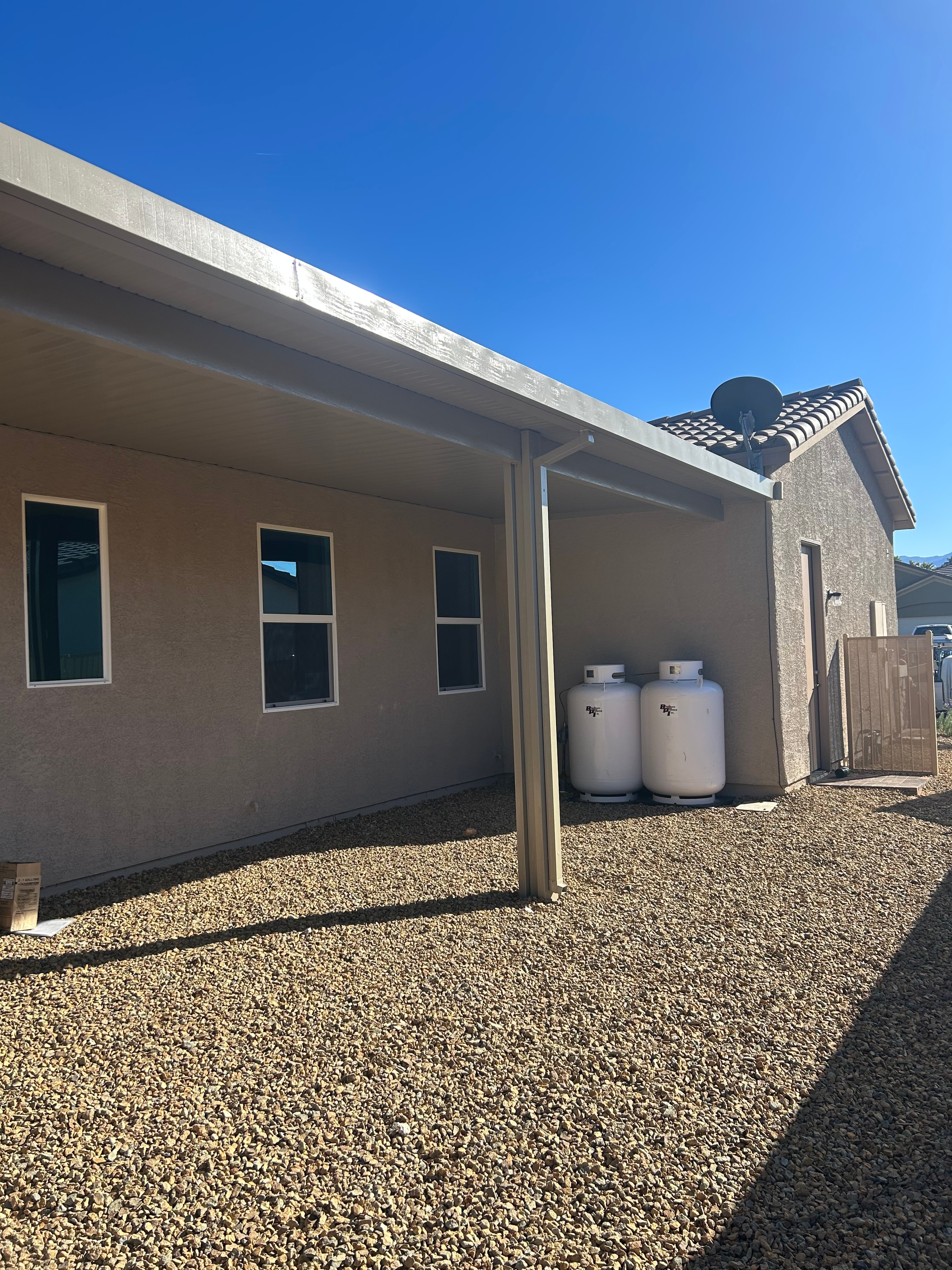 Solid patio cover providing full shade