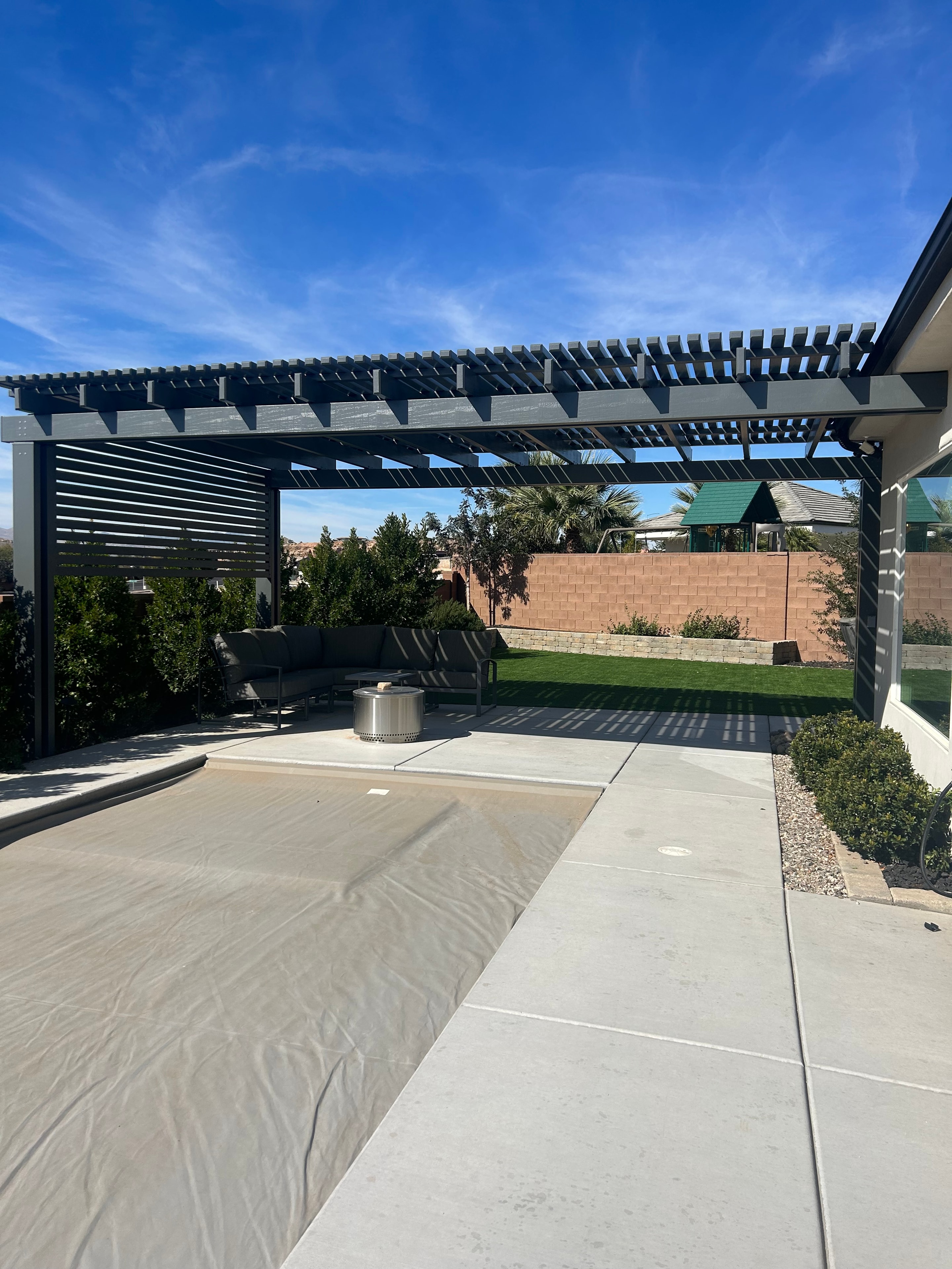 Retractable awning installed on a residential home patio